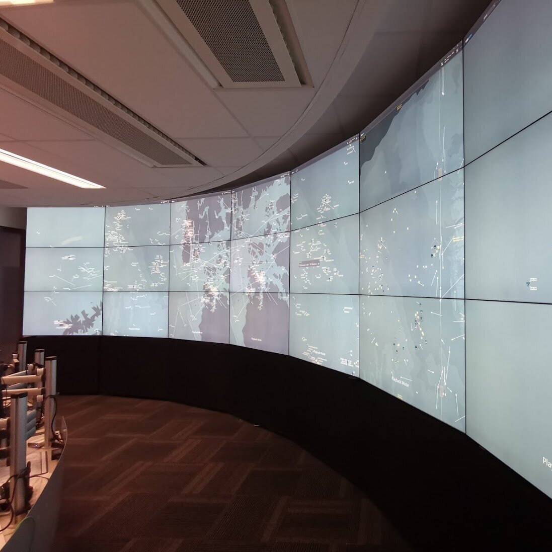 a view of several screens that are part of a marine control room