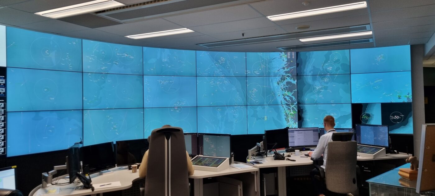 a megawall of screens monitoring vessel activity in real time